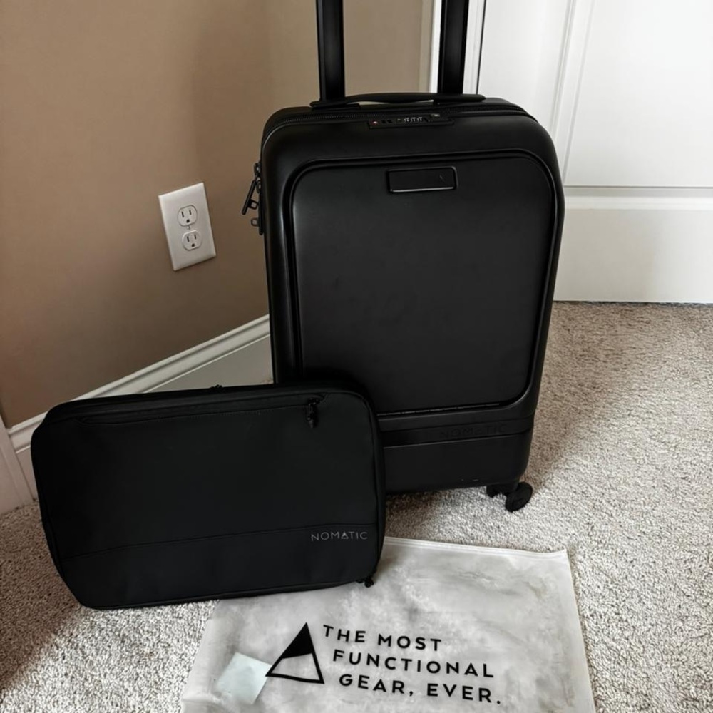 Nomadic Carry On Pro 22 inch spinner suitcase